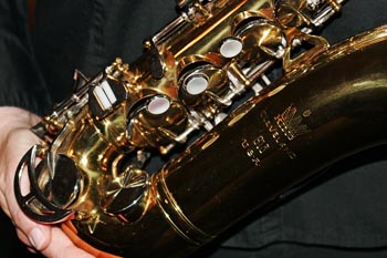Saxophone being held